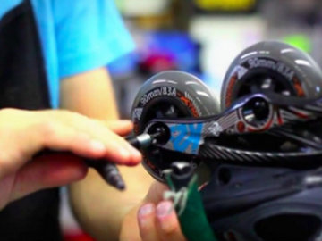 Montage de roues sur un patin en ligne